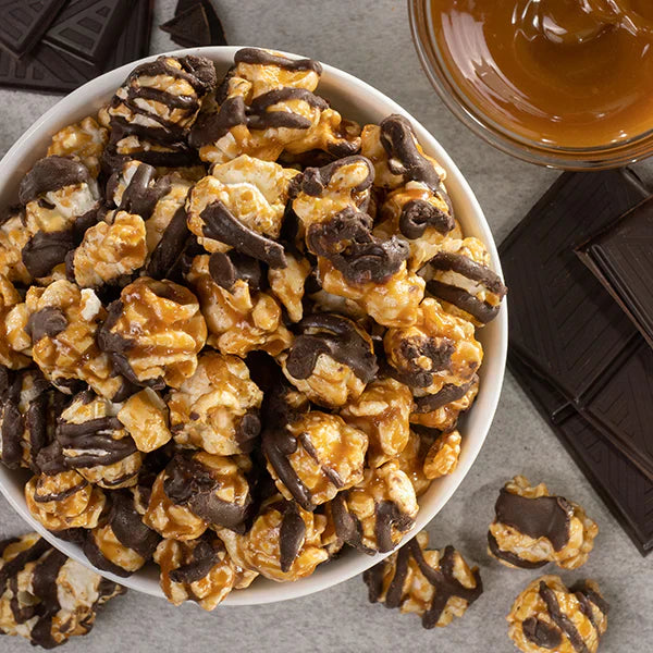 Flatlay shot of a bowl of chocolate caramel gourmet popcorn from Bri Marie.