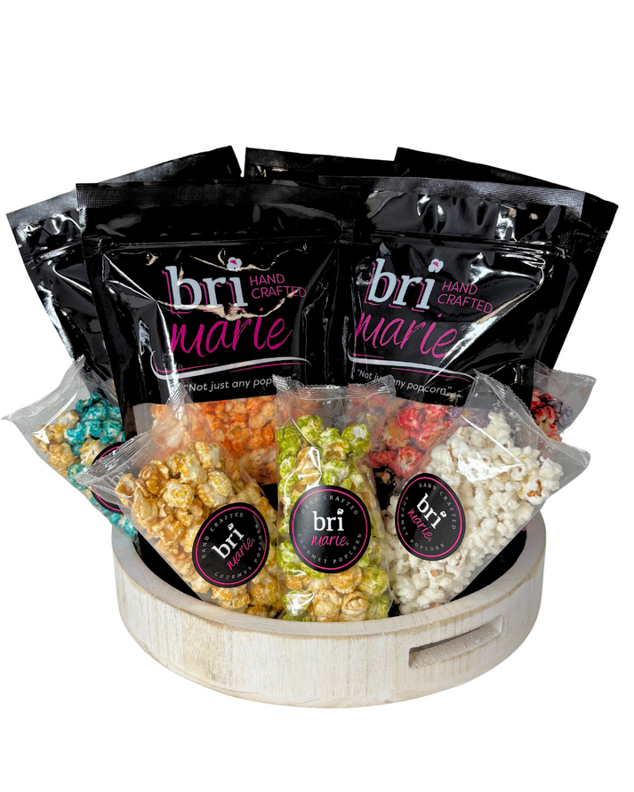 Bri Marie Blue Raspberry & Caramel popcorn with tangy dill flavor in a bowl, featuring non-GMO popcorn kernels.