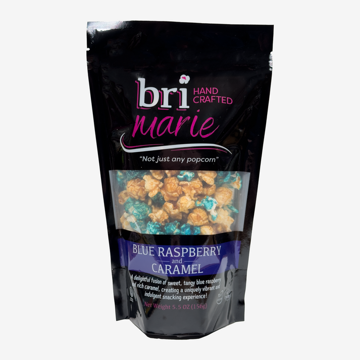 Bri Marie Blue Raspberry & Caramel popcorn with tangy dill flavor in a bowl, featuring non-GMO popcorn kernels.