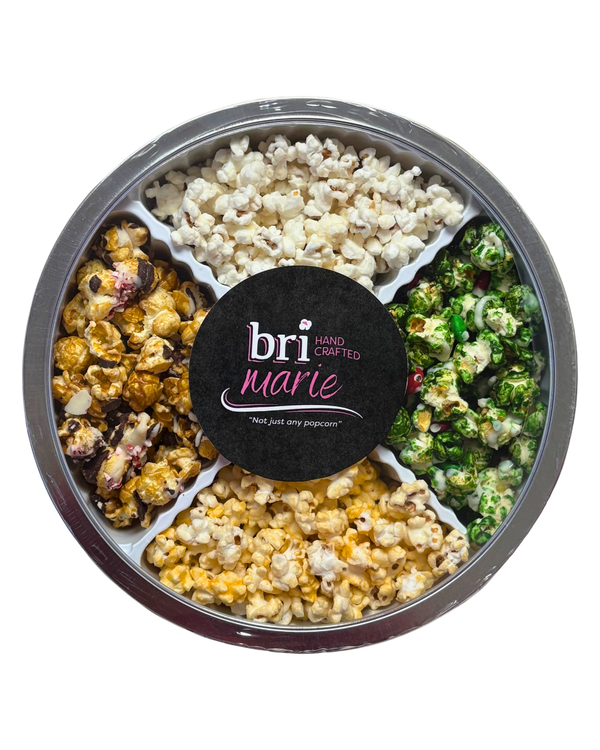 Quad tin popcorn gift with four assorted gourmet popcorn flavors