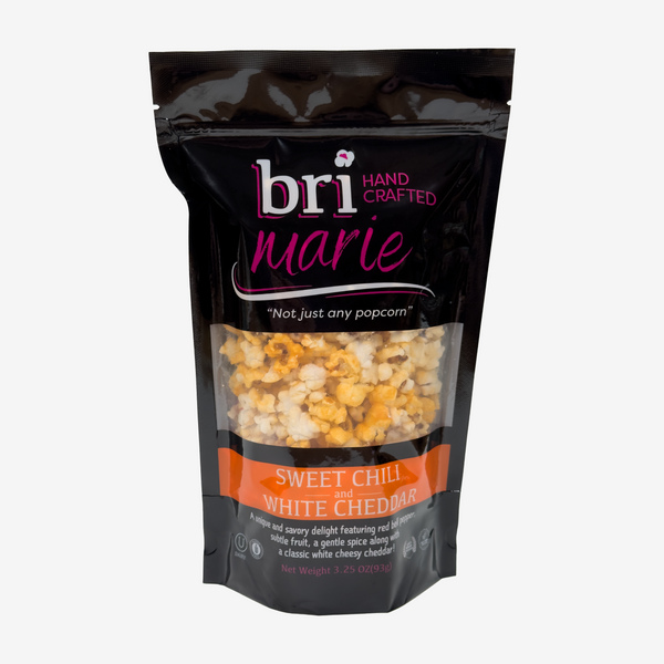 Quad tin popcorn gift with four assorted gourmet popcorn flavors