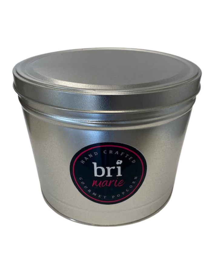 Bri Marie Blue Raspberry & Caramel popcorn with tangy dill flavor in a bowl, featuring non-GMO popcorn kernels.